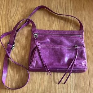 Like new!  HOBO cross body with fun fabric interior.  Pink for spring!!